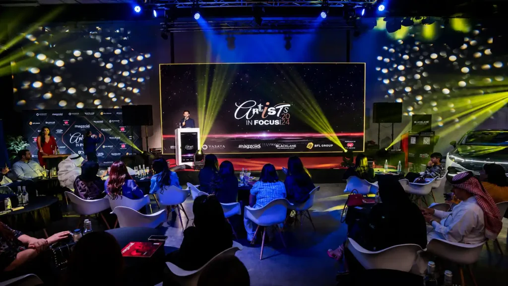 Event host interacting with guests during a luxury corporate event